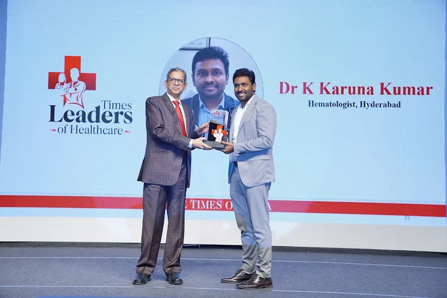 Dr Karuna Kumar receiving the Times of India Leaders of Healthcare award from former Chief Justice of India N. V. Ramana, 2025